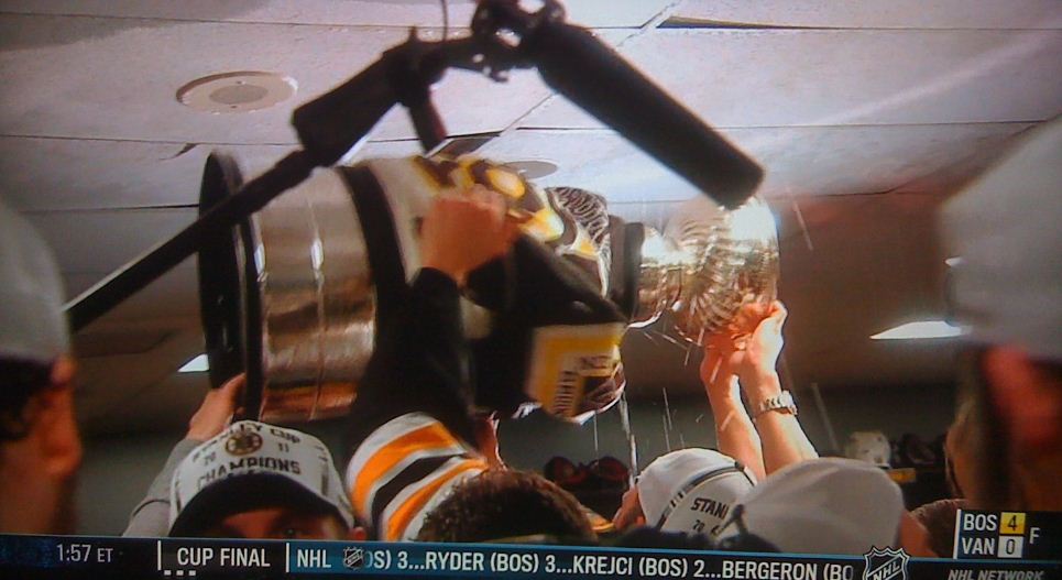 Bruins Wrap Stanley Cup in Vintage Team Jacket After Stanley Cup Game 7 Win (Photos)