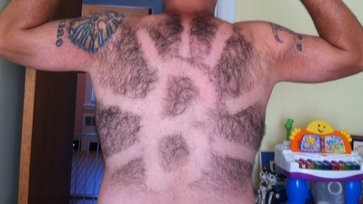 Bruins Fan Shaves B's Logo Into Back Hair in Effort to Land Opening Night Tickets (Photo)