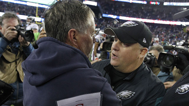 New England Patriots head coach Bill Belichick (L) shakes hands with Philadelphia Eagles head coach Chip Kelly