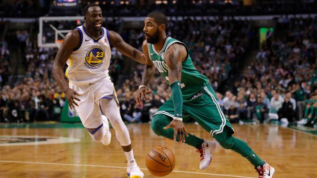 Golden State Warriors forward Draymond Green and Boston Celtics guard Kyrie Irving