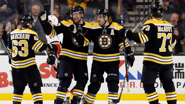 Boston bruins center Patrice Bergeron, wingers Brad Marchand and David Backes and defenseman Charlie McAvoy