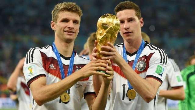 Germany midfielders Thomas Muller (left) and Julian Draxler (right)