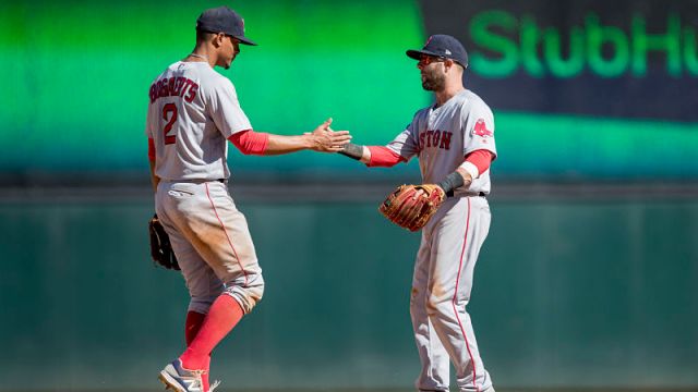 Boston Red Sox infielders Xander Bogaerts and Dustin Pedroia