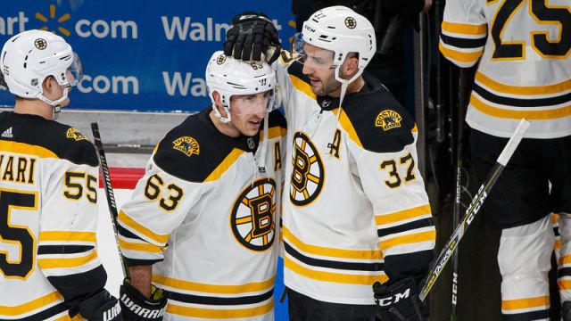 Boston Bruins forwards Brad Marchand and Patrice Bergeron