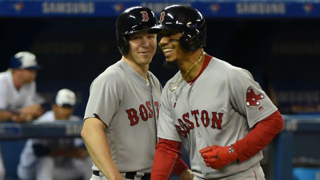 Boston Red Sox infielder Brock Holt and outfielder Mookie Betts