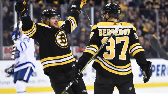 Boston Bruins right wing David Pastrnak and center Patrice Bergeron