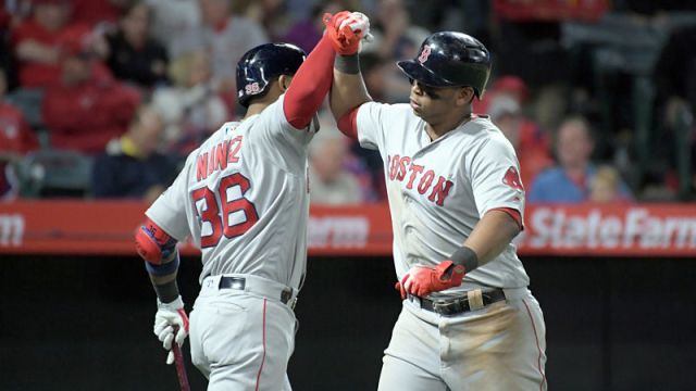 Boston Red Sox third baseman Rafael Devers and second baseman Eduardo Nunez