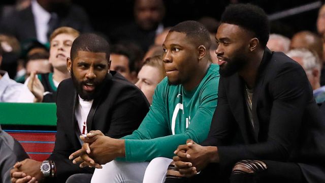 Boston Celtics guards Kyrie Irving and Jaylen Brown and forward Guerschon Yabusele