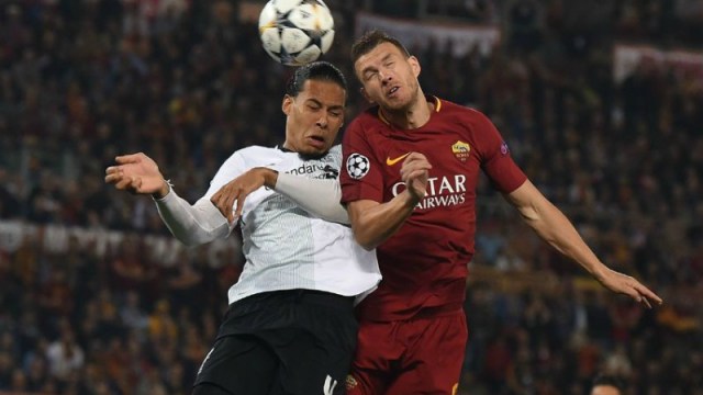 Liverpool's Virgil van Dijk and Roma's Edin Dzeko