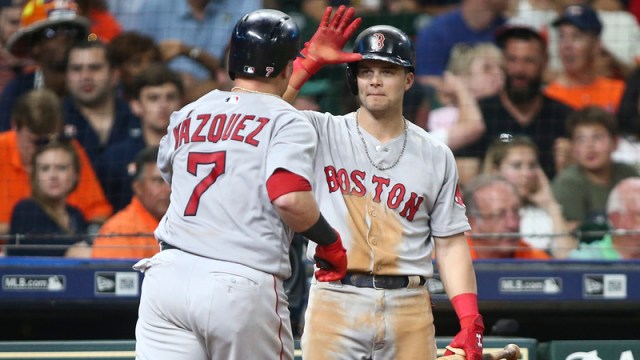 Boston Red Sox's Christian Vazquez And Andrew Benintendi
