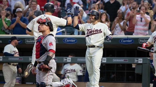 Boston Red Sox catcher Christian Vazquez and Minnesota Twins second baseman Brian Dozier