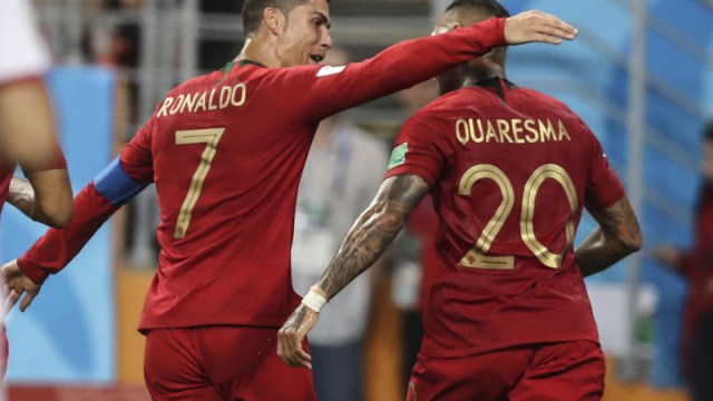 Portugal's Cristiano Ronaldo and Ricardo Quaresma