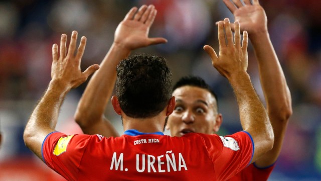 Costa Rica forward Marco Urena (21) and midfielder David Guzman