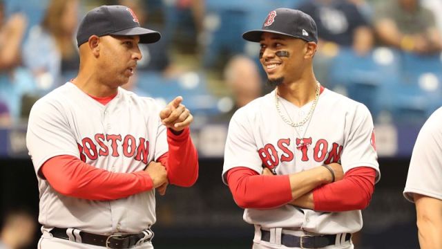 Boston Red Sox manager Alex Cora and outfielder Mookie Betts