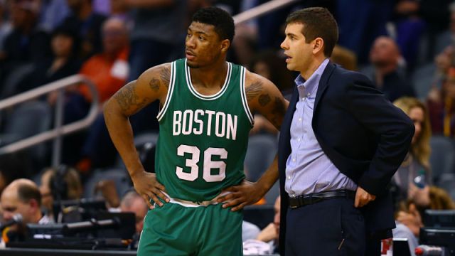 Boston Celtics guard Marcus Smart and head coach Brad Stevens