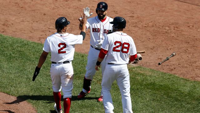 Boston Red Sox shortstop Xander Bogaerts, outfielder J.D. Martinez and catcher Sandy Leon