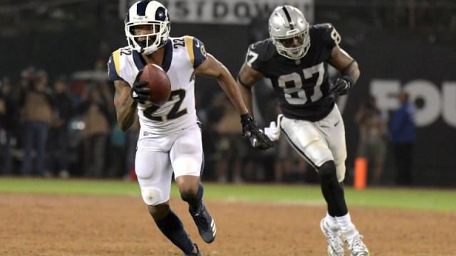 Los Angeles Rams cornerback Marcus Peters (22) and Oakland Raiders tight end Jared Cook (87)