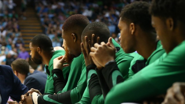 Celtics players on the bench