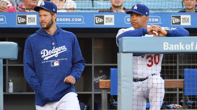 Los Angeles Dodgers Starting Pitcher Clayton Kershaw And Manager Dave Roberts