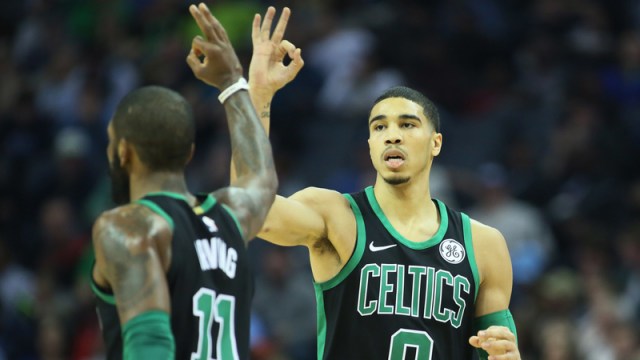 Boston Celtics' Kyrie Irving and Jayson Tatum