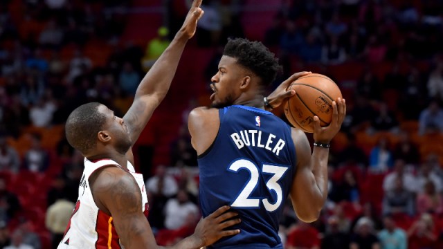 Minnesota Timberwolves forward Jimmy Butler (23) and Miami Heat guard Dion Waiters