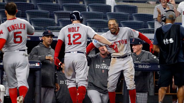 Boston Red Sox outfielder Mookie Betts and infielder Brock Holt