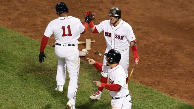 Boston Red Sox third baseman Rafael Devers, catcher Christian Vazquez and first baseman Steve Pearce
