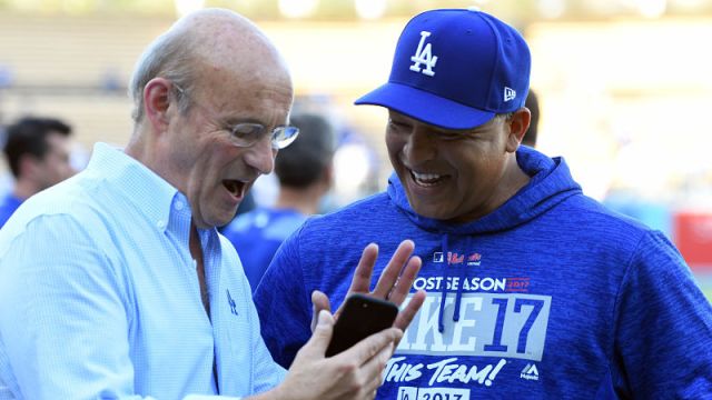 Los Angeles Dodgers president Stan Kasten and manager Dave Roberts