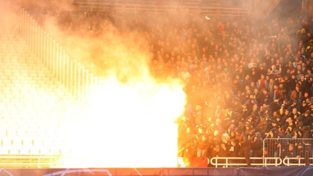 Ajax fans hit with Molotov cocktail