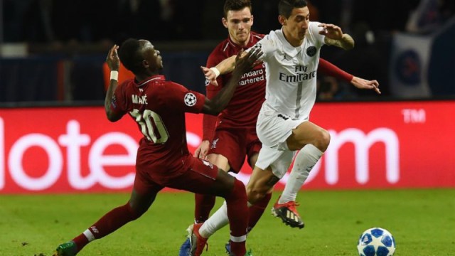 PSG's Angel di Maria and Liverpool's Sadio Mane (left) and Andrew Robertson (center)