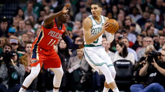 New Orleans Pelicans guard Jrue Holiday and Boston Celtics forward Jayson Tatum