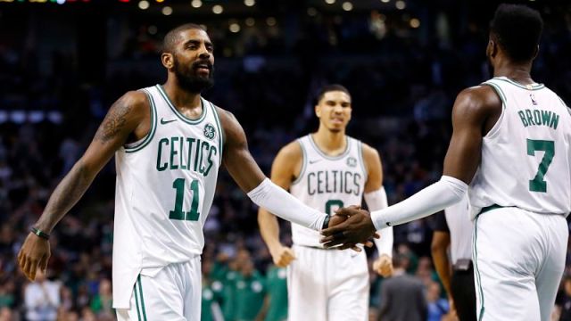 Boston Celtics guard Kyrie Irving and forwards Jayson Tatum and Jaylen Brown
