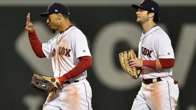 Boston Red Sox outfielders Mookie Betts and Andrew Benintendi