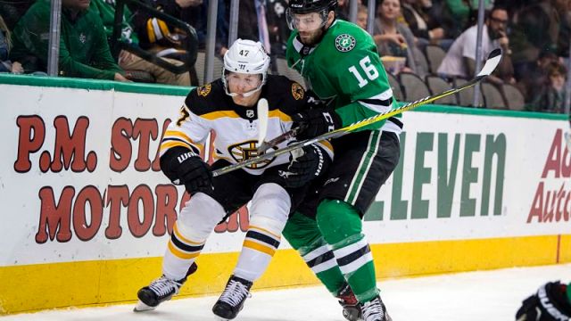 Boston Bruins defenseman Torey Krug and Dallas Stars forward Jason Dickinson