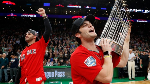 Boston Red Sox outfielder Andrew Benintendi (right) and designated hitter J.D. Martinez
