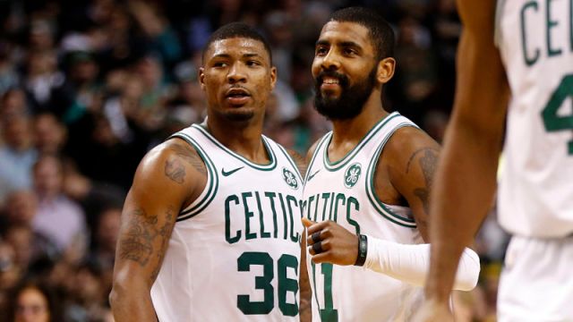 Boston Celtics guards Marcus Smart and Kyrie Irving