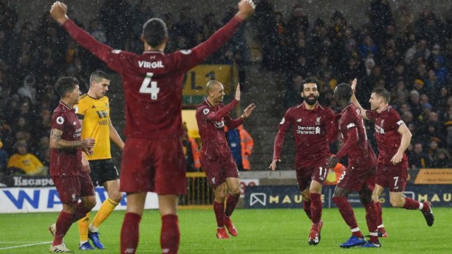 Liverpool's Virgil van Dijk, Mohamed Salah and teammtes