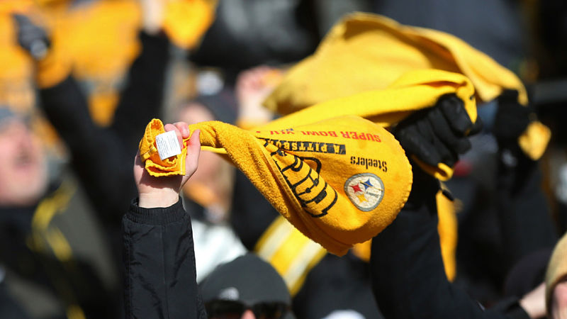 Steelers fan chokes pregnant Chargers fan at game, photos and