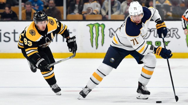 Boston Bruins' Brad Marchand And Buffalo Sabres' Evan Rodrigues