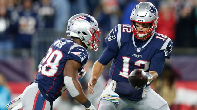 New England Patriots running back James White and quarterback Tom Brady