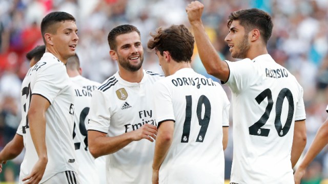 Real Madrid midfielder Marco Asensio (20) and teammates