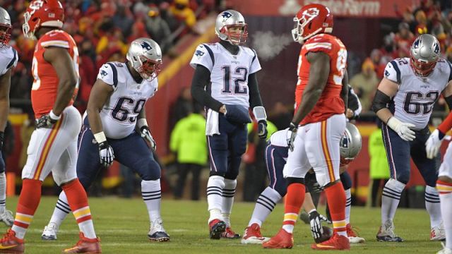 New England Patriots offensive lineman Shaq Mason and quarterback Tom Brady