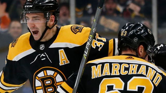 Boston Bruins players Patrice Bergeron and Brad Marchand