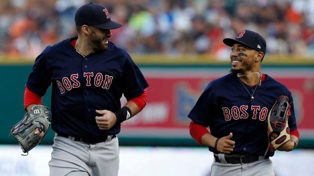 Boston Red Sox outfielders J.D. Martinez and Mookie Betts