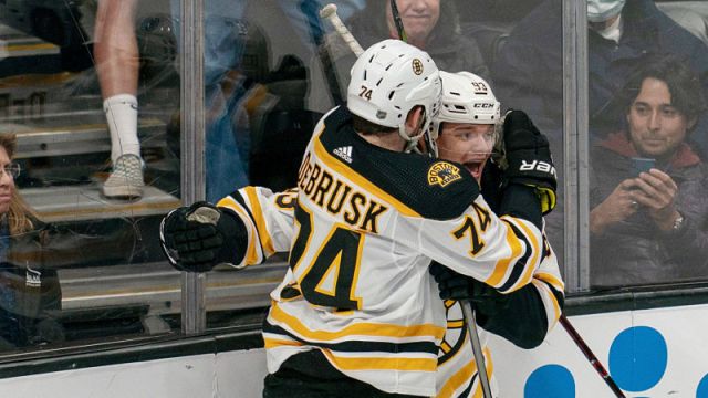 Boston Bruins forwards Jake DeBrusk and Karson Kuhlman