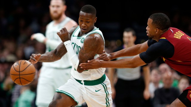 Boston Celtics guard Terry Rozier (left) and Cleveland Cavaliers guard Rodney Hood