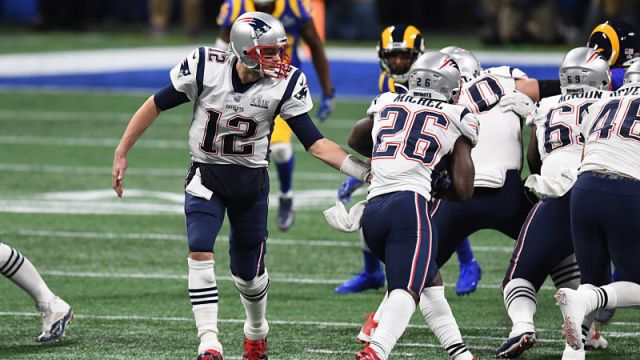 New England Patriots quarterback Tom Brady and running back Sony Michel