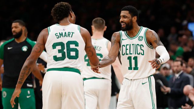 Boston Celtics guards Marcus Smart and Kyrie Irving
