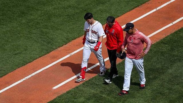 Boston Red Sox outfielder Andrew Benintendi, manger Alex Cora
