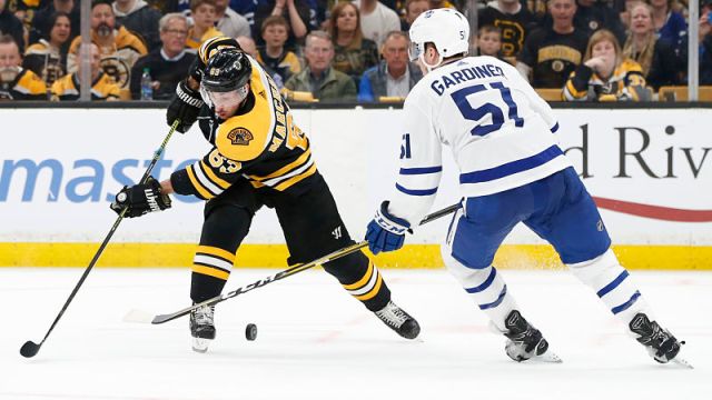 Boston Bruins forward Brad Marchand and Toronto Maple Leafs defenseman Jake Gardiner